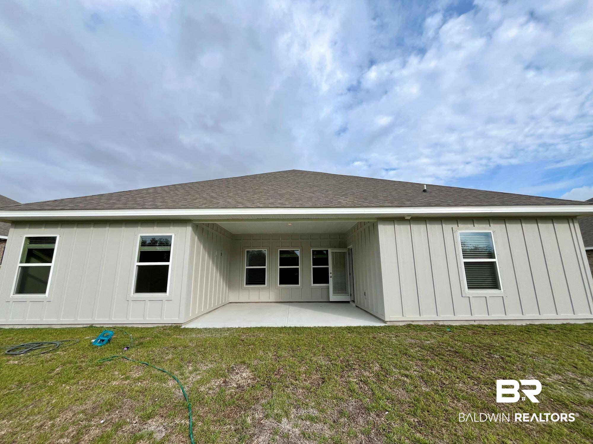 337 Barndling Street Fairhope, AL 36532 - Photo 29 of 34 Back of property featuring a yard and a patio area