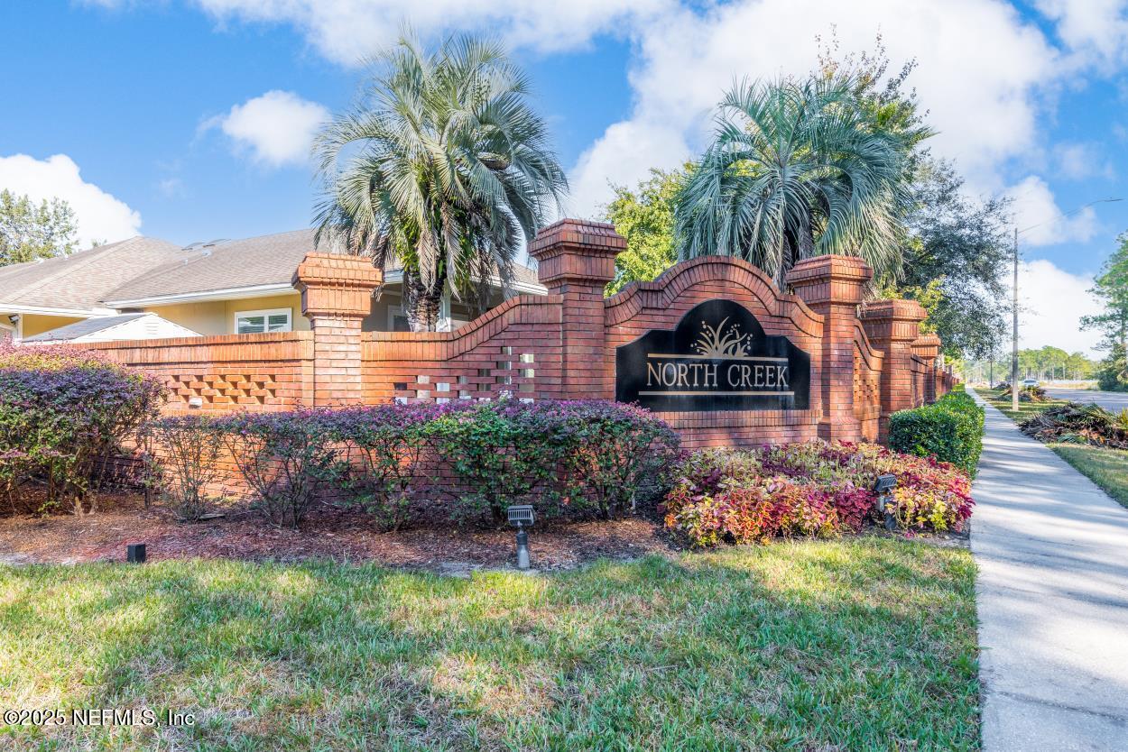 700 Reflection Cove Road East Jacksonville, FL 32218 - Photo 50 of 62 a front view of a house with garden