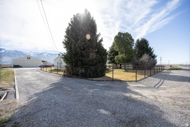 1981 South Main Street Lewiston, UT 84320 - Photo 15 of 47 View of dirt / gravel driveway featuring a mountain view