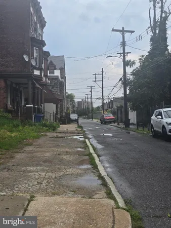 a view of a street with houses