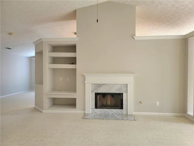 a room with a fireplace