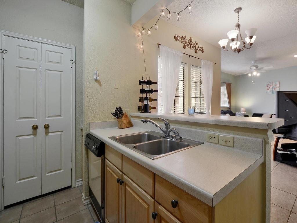 3001 Cedar Street, Unit 117 Austin, TX 78705 - Photo 20 of 20 a bathroom with a sink a vanity and a mirror