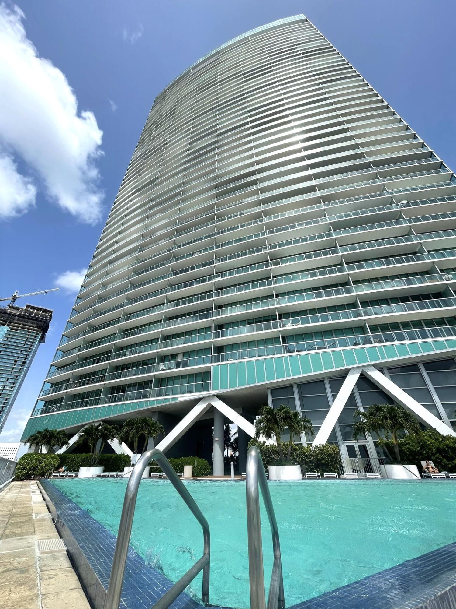 a front view of a house with backyard