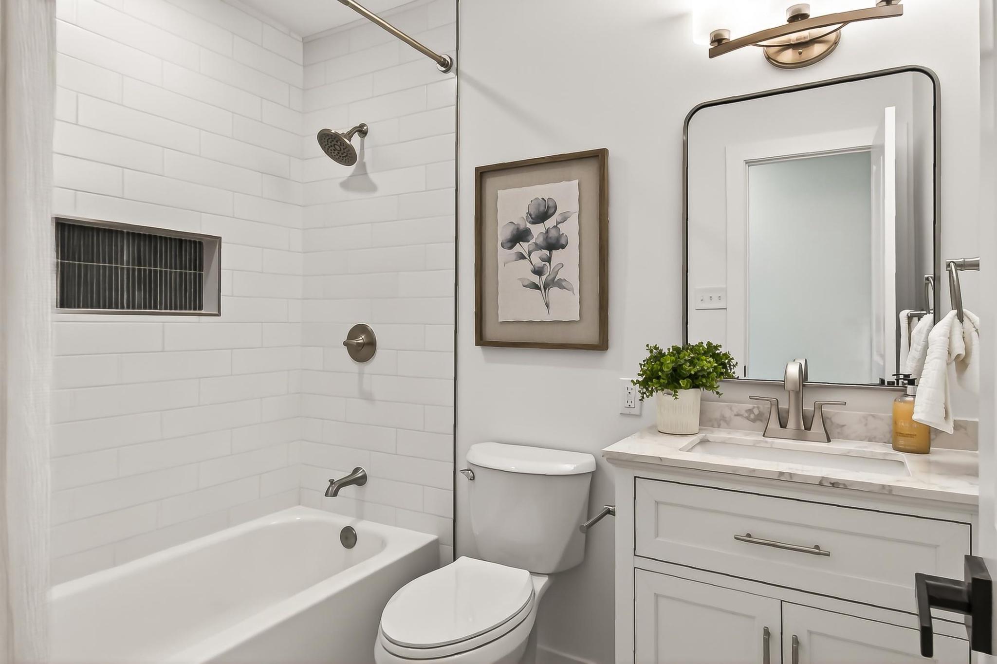 7124 Whetstone Road Alexandria, VA 22306 - Photo 23 of 37 Hall bathroom with beautiful finishes.