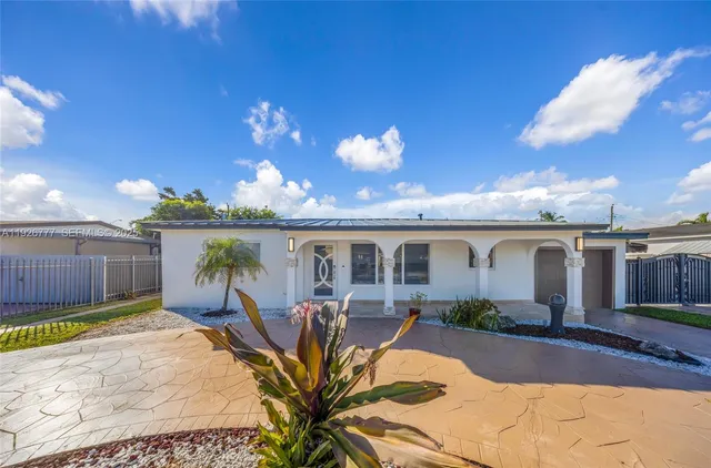 front view of a house with a patio