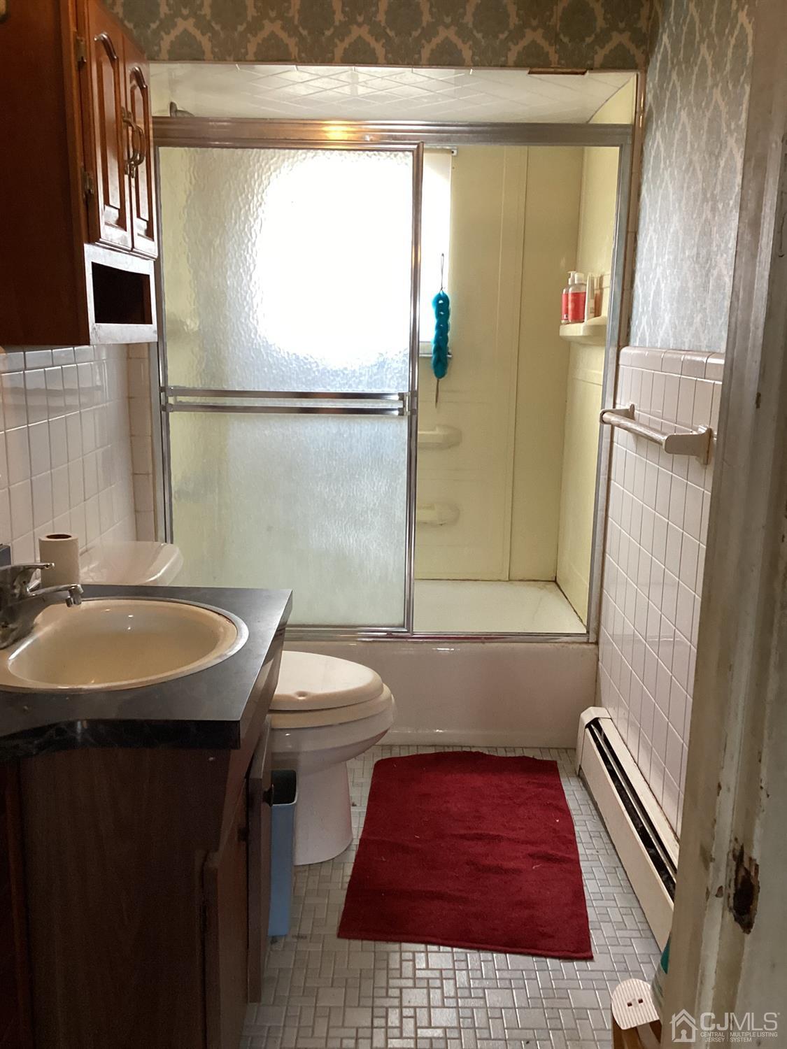 39 Silver Lake Avenue Edison, NJ 08817 - Photo 12 of 20 a bathroom with a sink toilet and shower