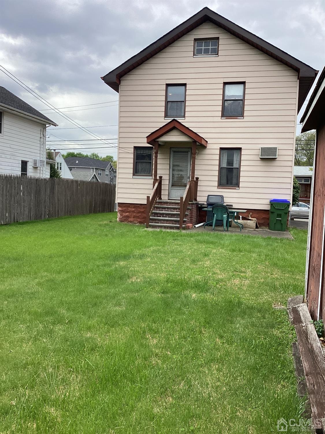 39 Silver Lake Avenue Edison, NJ 08817 - Photo 15 of 20 a view of a house with a yard and deck