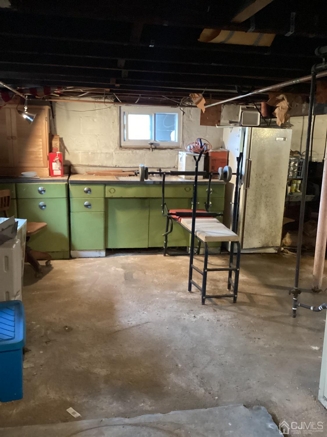 39 Silver Lake Avenue Edison, NJ 08817 - Photo 17 of 20 a living room with furniture a window and a table