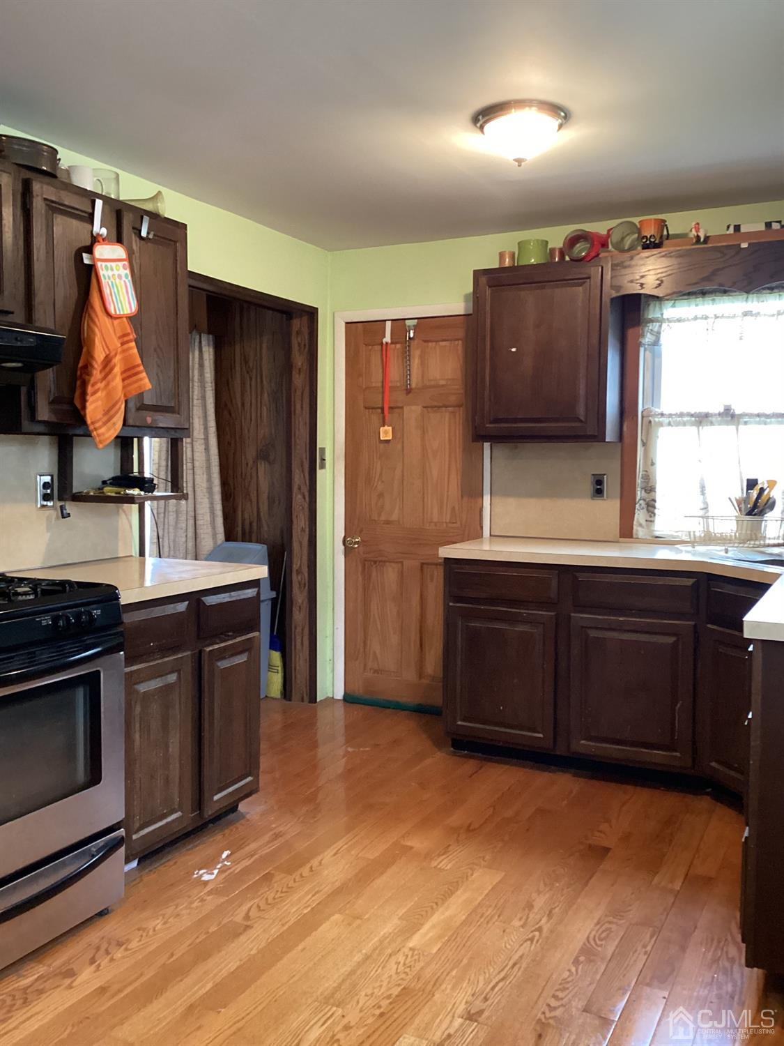 39 Silver Lake Avenue Edison, NJ 08817 - Photo 6 of 20 a kitchen with stainless steel appliances granite countertop a sink and a stove