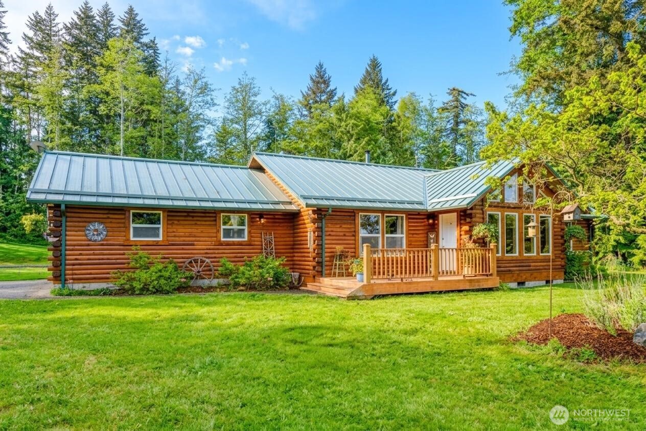 134 Bishop Road Port Angeles, WA 98363 - Photo 29 of 38 a view of a house with a yard
