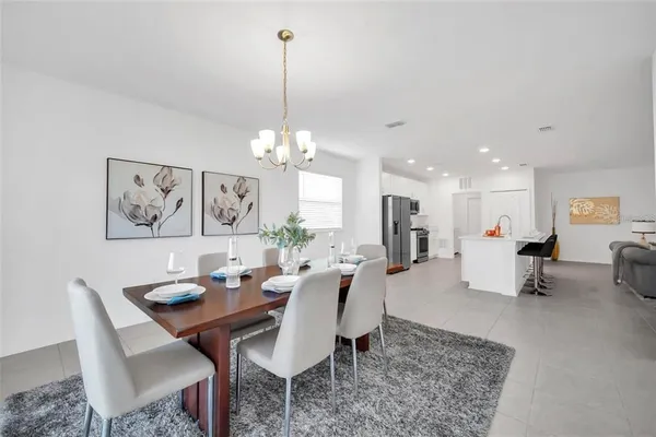 a view of a dining room and livingroom