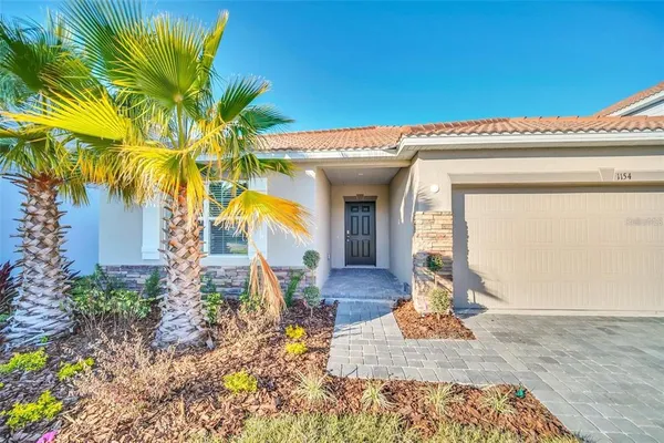 a view of a house with a patio