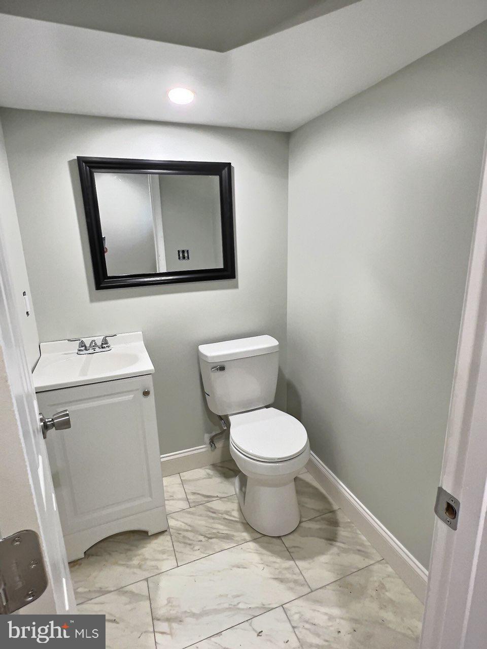 18 Haley Road Essex, MD 21221 - Photo 9 of 13 Powder room in Basement