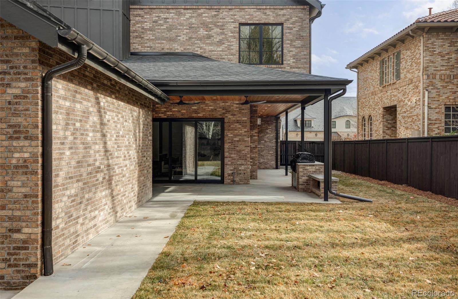 295 Kearney Street Denver, CO 80220 - Photo 16 of 39 a view of a porch with a table and chairs