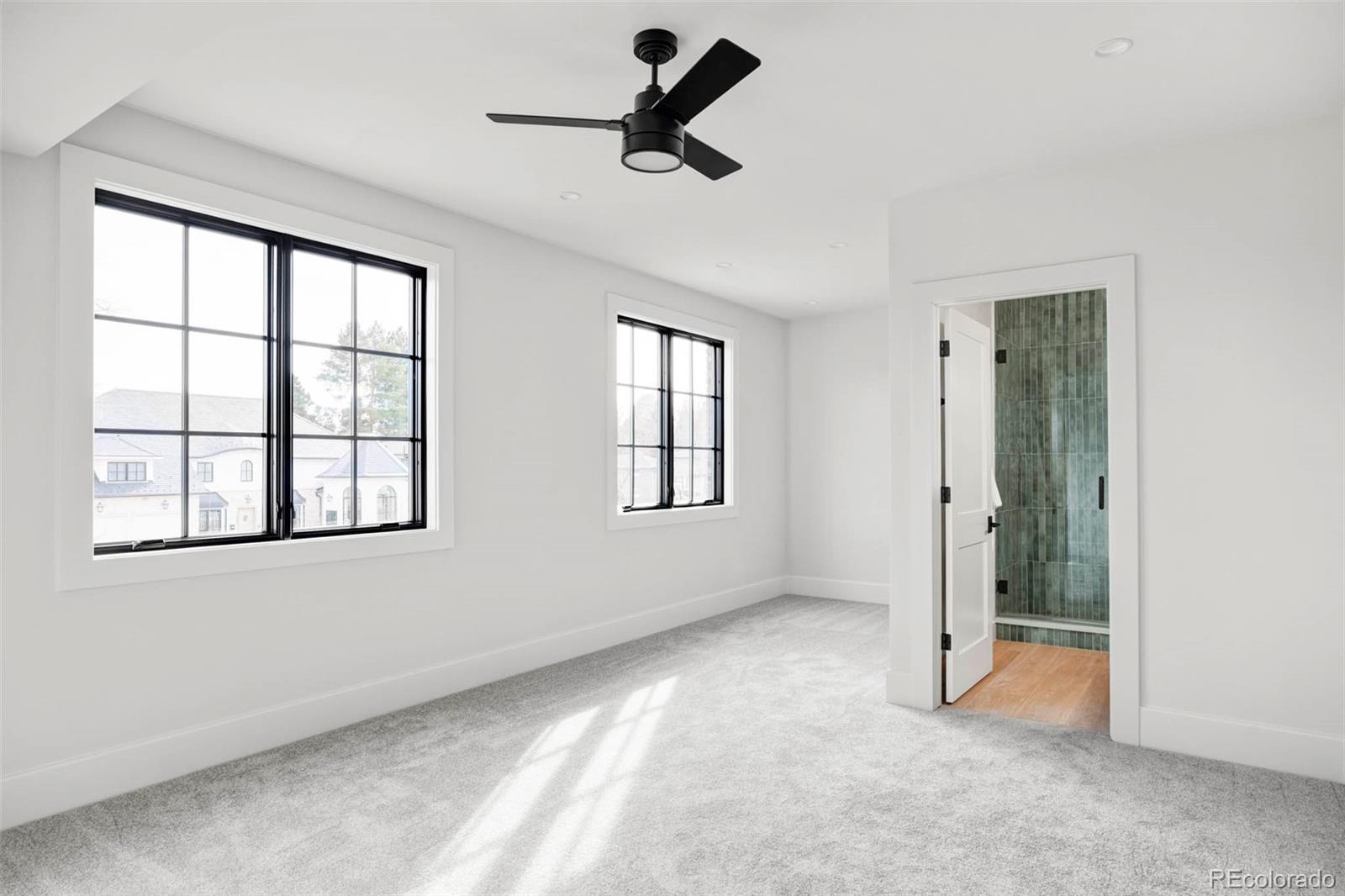 295 Kearney Street Denver, CO 80220 - Photo 18 of 41 a view of an empty room with a window