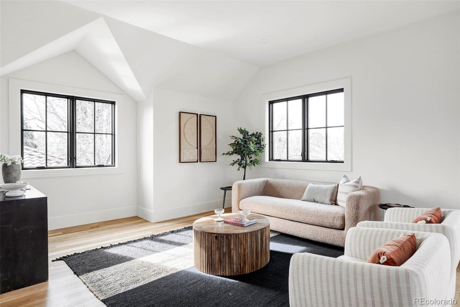 295 Kearney Street Denver, CO 80220 - Photo 25 of 41 a living room with furniture and window
