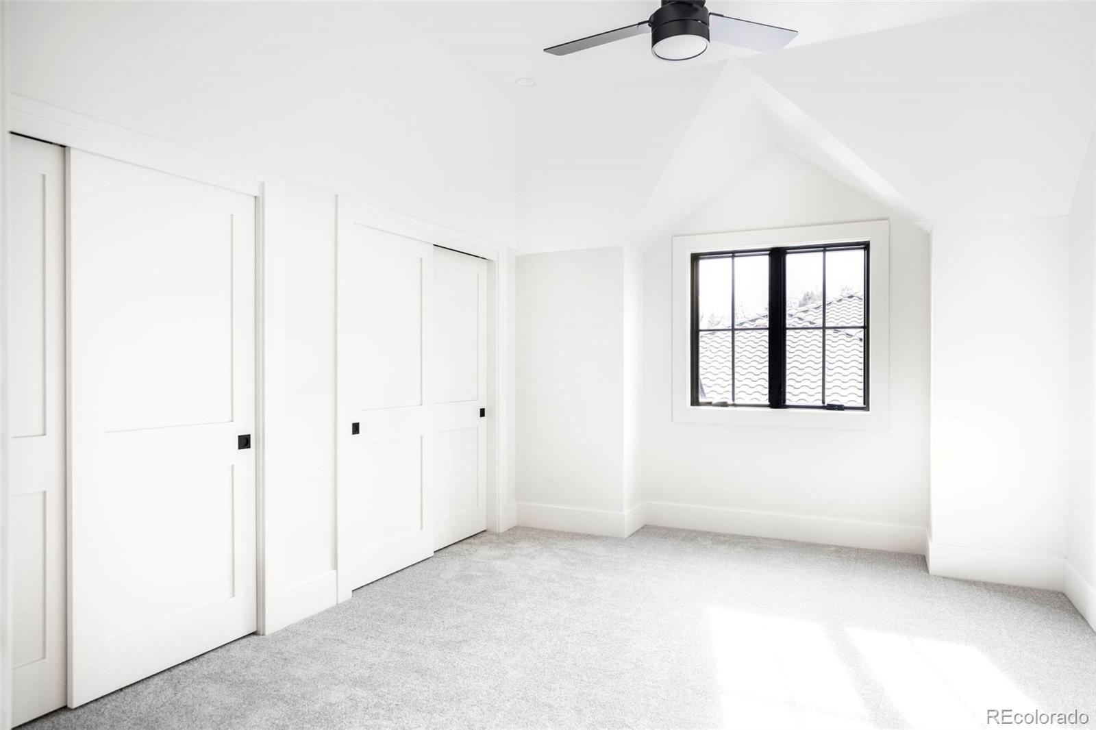295 Kearney Street Denver, CO 80220 - Photo 31 of 41 a view of an empty room with windows