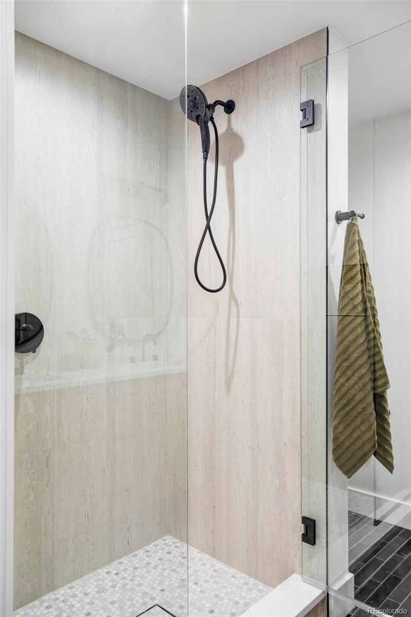 295 Kearney Street Denver, CO 80220 - Photo 38 of 39 a walk in closet and a shower curtain