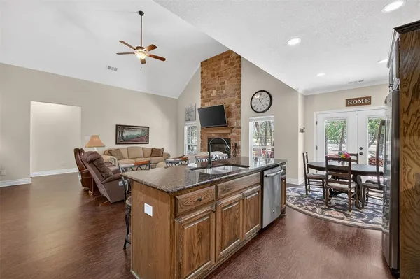 a kitchen with a stove and a table