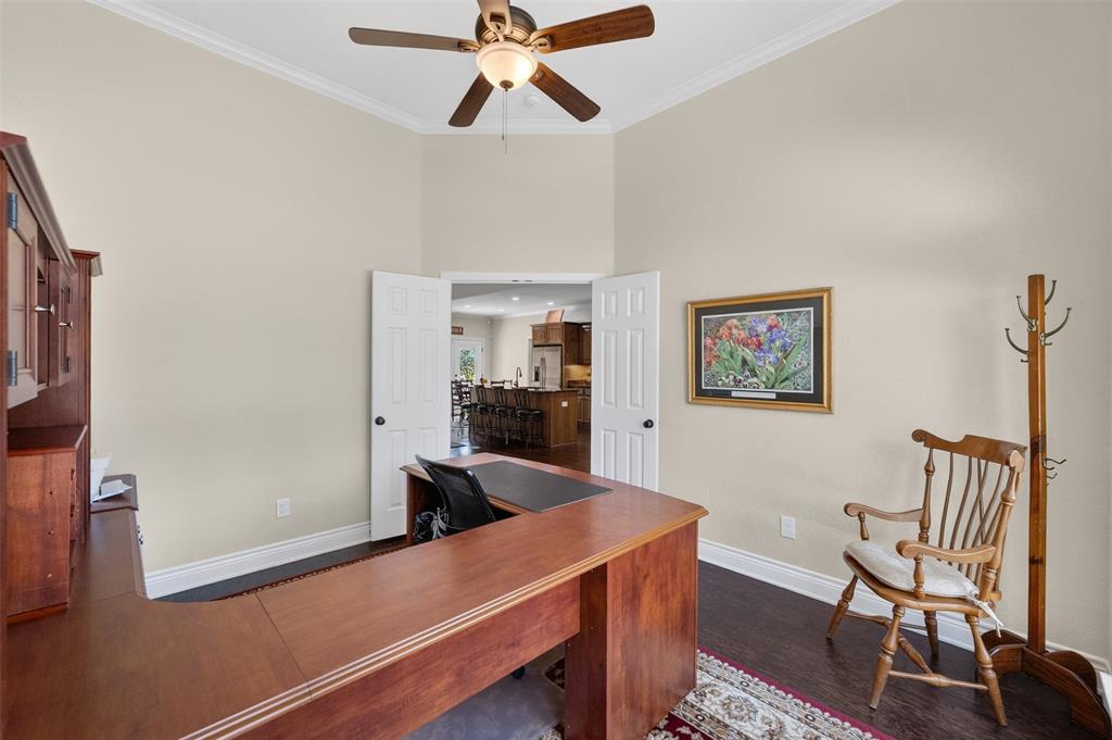 403 Arrowhead Point Kerens, TX 75144 - Photo 19 of 40 a view of a workspace with furniture and a window