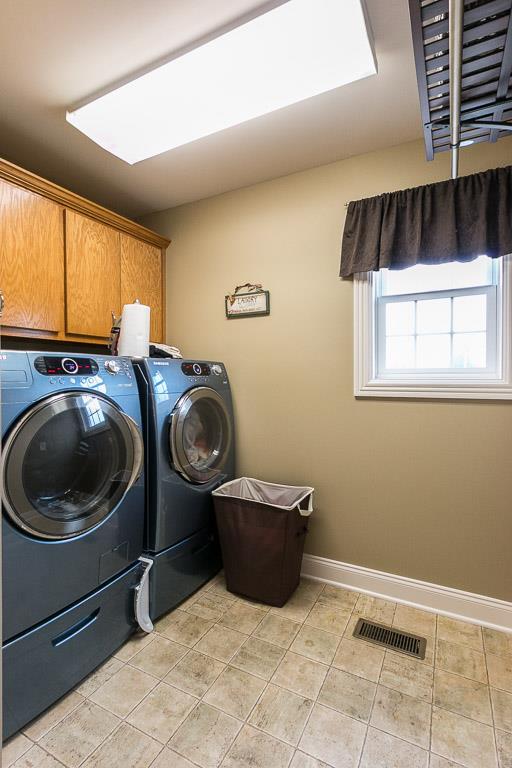 1232 Sugar Flat Road Lebanon, TN 37087 - Photo 15 of 30 a room with a washing machine and washing machine
