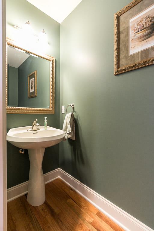 1232 Sugar Flat Road Lebanon, TN 37087 - Photo 18 of 30 a bathroom with a sink and mirror