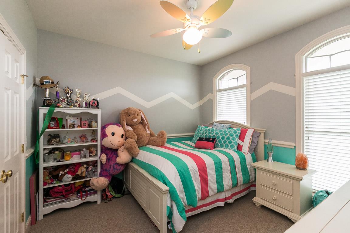 1232 Sugar Flat Road Lebanon, TN 37087 - Photo 24 of 30 a bedroom with a bed and a window
