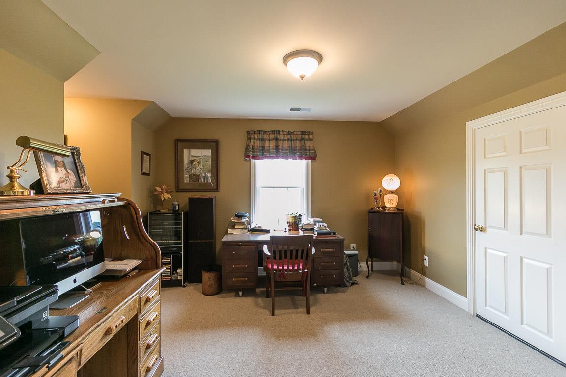 1232 Sugar Flat Road Lebanon, TN 37087 - Photo 30 of 30 a living room with furniture a desk and a piano