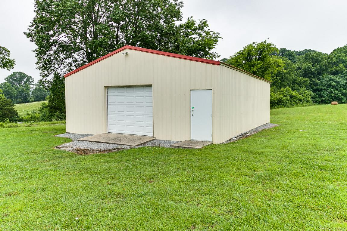 1232 Sugar Flat Road Lebanon, TN 37087 - Photo 7 of 30 a backyard of a house with lots of green space