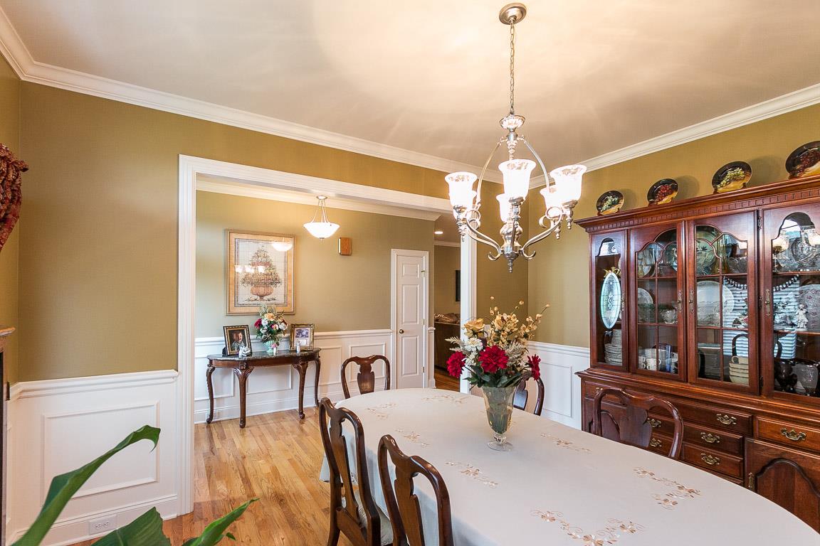 1232 Sugar Flat Road Lebanon, TN 37087 - Photo 9 of 30 a dining room with furniture a chandelier and window