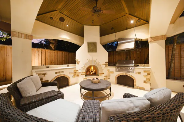 a view of an empty room with a fireplace