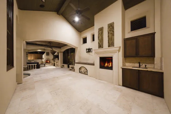 a bathroom with a granite countertop sink mirror toilet and shower