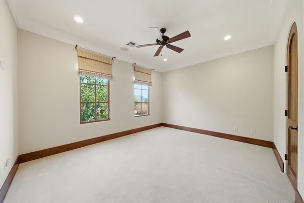 a bathroom with a granite countertop sink and a bathtub