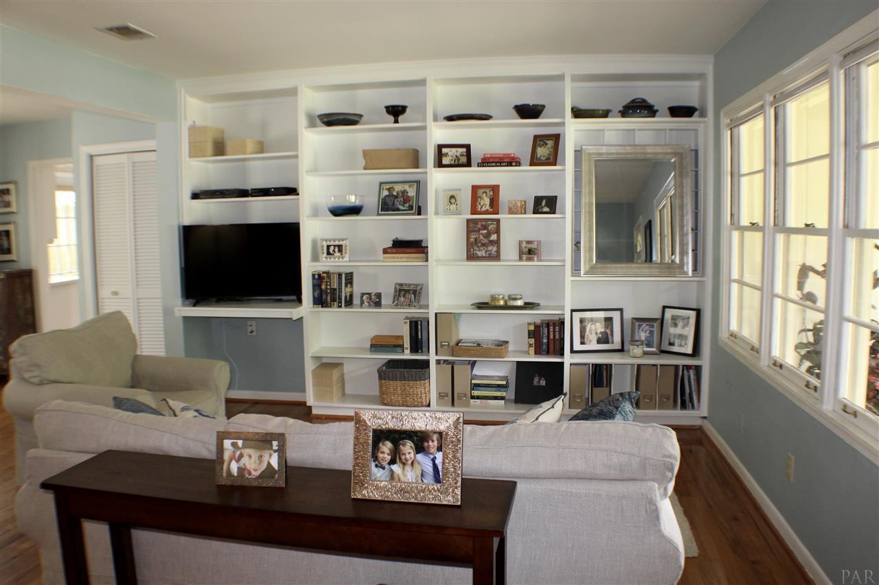 110 Country Club Road Pensacola, FL 32507 - Photo 5 of 25 Living room with built in bookshelves and gorgeous