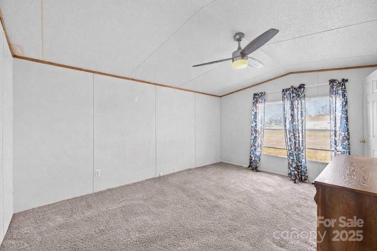 2909 New Town Road Monroe, NC 28110 - Photo 17 of 31 a view of an empty room with a window