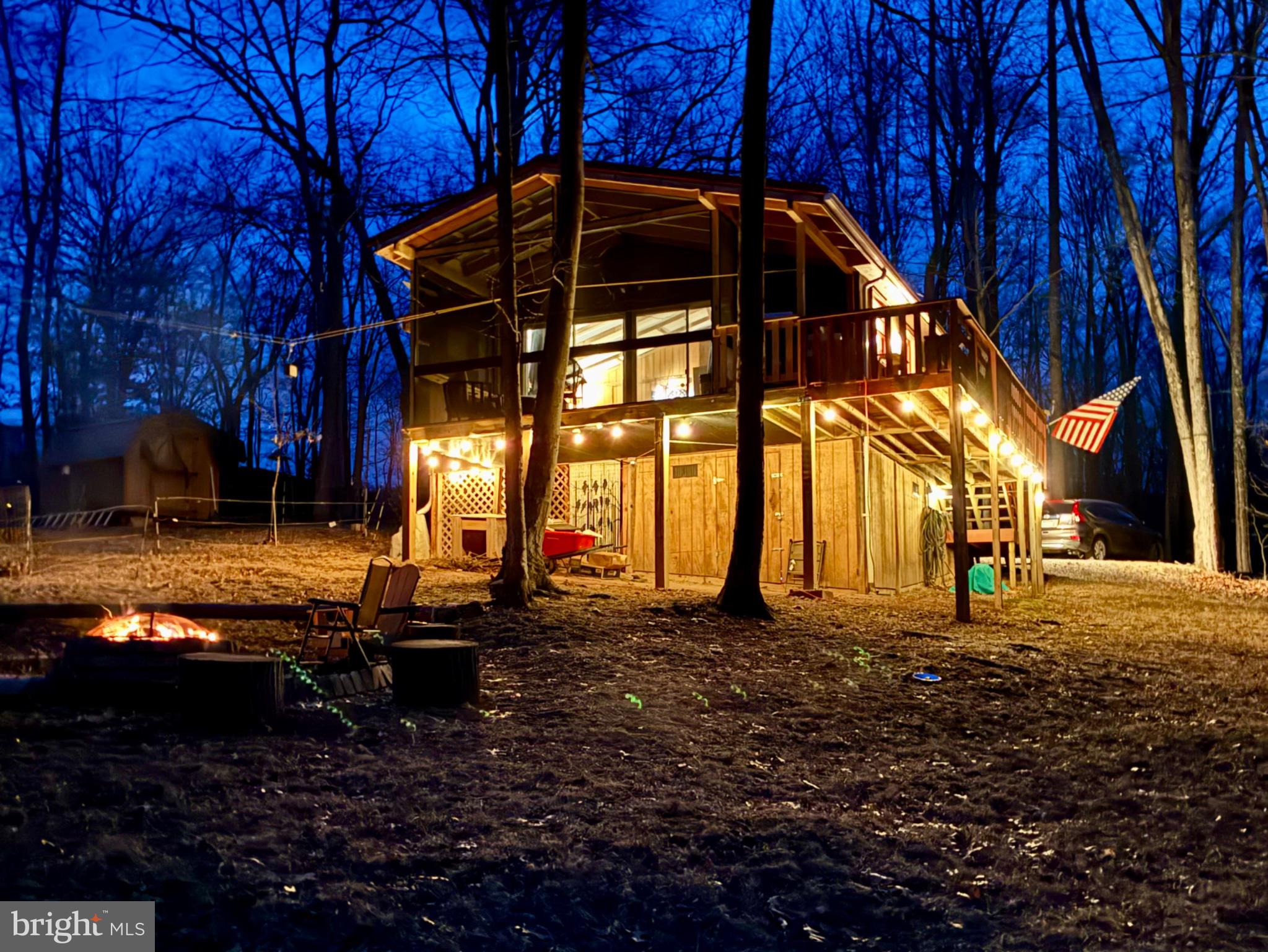 Charming cabin under twilight skies.
