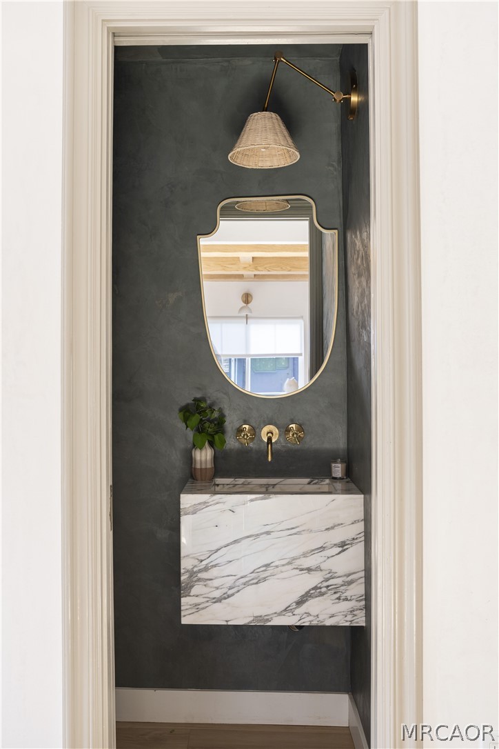 27643 West Shore Road, Unit 1 Lake Arrowhead, CA 92352 - Photo 11 of 28 a room with mirror light and toilet