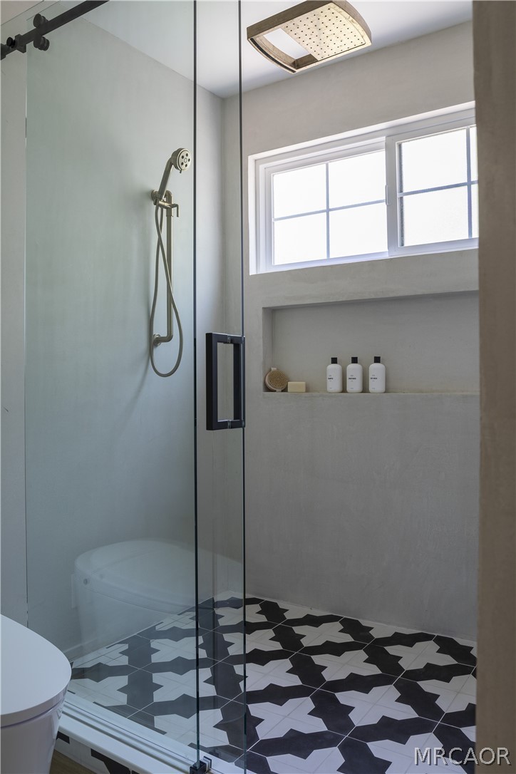 27643 West Shore Road, Unit 1 Lake Arrowhead, CA 92352 - Photo 14 of 28 a bathroom with a sink and a shower