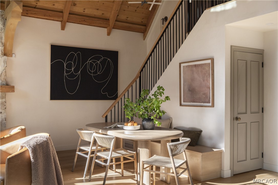27643 West Shore Road, Unit 1 Lake Arrowhead, CA 92352 - Photo 7 of 28 a table and chairs in a gallery