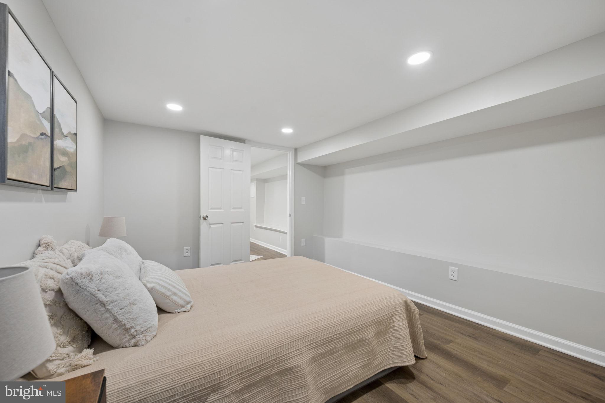 1108 South Clinton Street Baltimore, MD 21224 - Photo 53 of 66 Cozy, modern basement retreat.