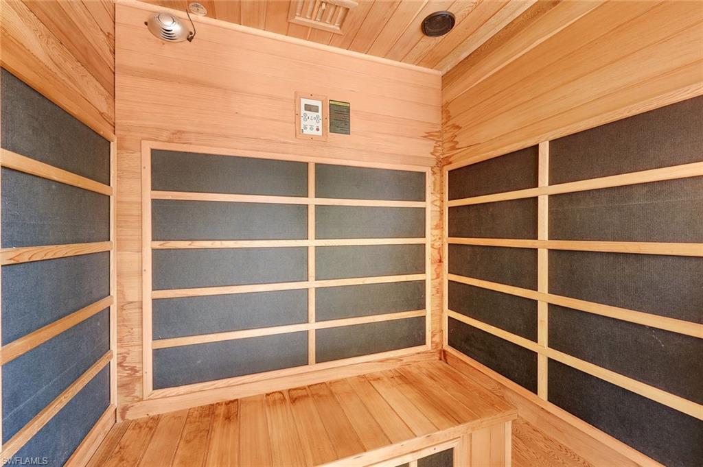 4244 Raffia Palm Circle Naples, FL 34119 - Photo 29 of 38 a view of a room with empty shelves