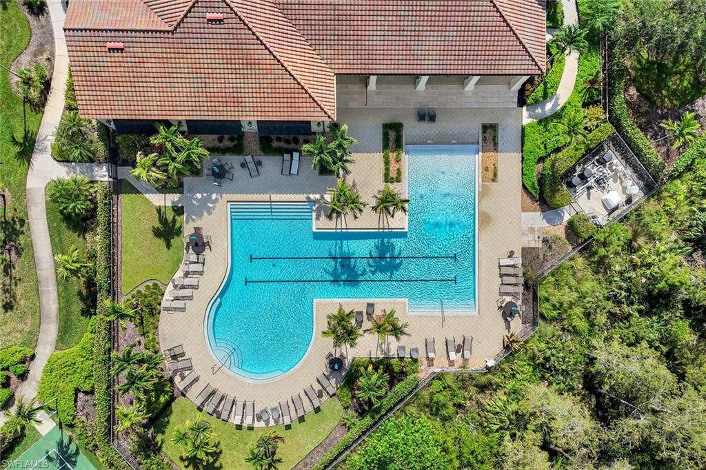 4244 Raffia Palm Circle Naples, FL 34119 - Photo 35 of 38 an aerial view of a house with a swimming pool