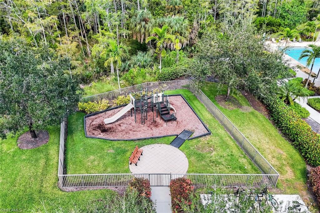 4244 Raffia Palm Circle Naples, FL 34119 - Photo 36 of 38 a view of an outdoor space yard and patio