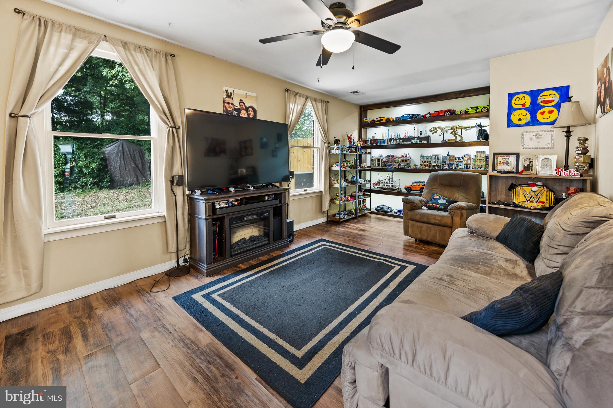 1715 Willow Place Clementon, NJ 08021 - Photo 14 of 37 a living room with furniture and a flat screen tv