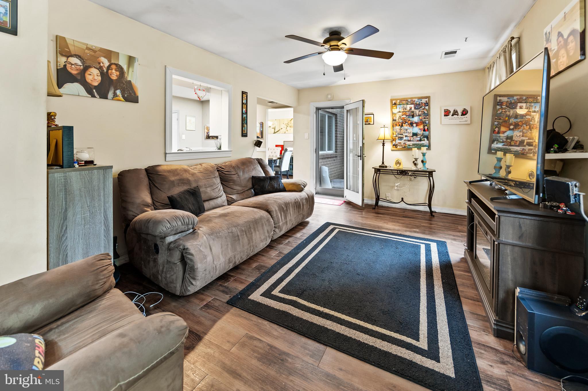 1715 Willow Place Clementon, NJ 08021 - Photo 15 of 37 a living room with furniture and a flat screen tv