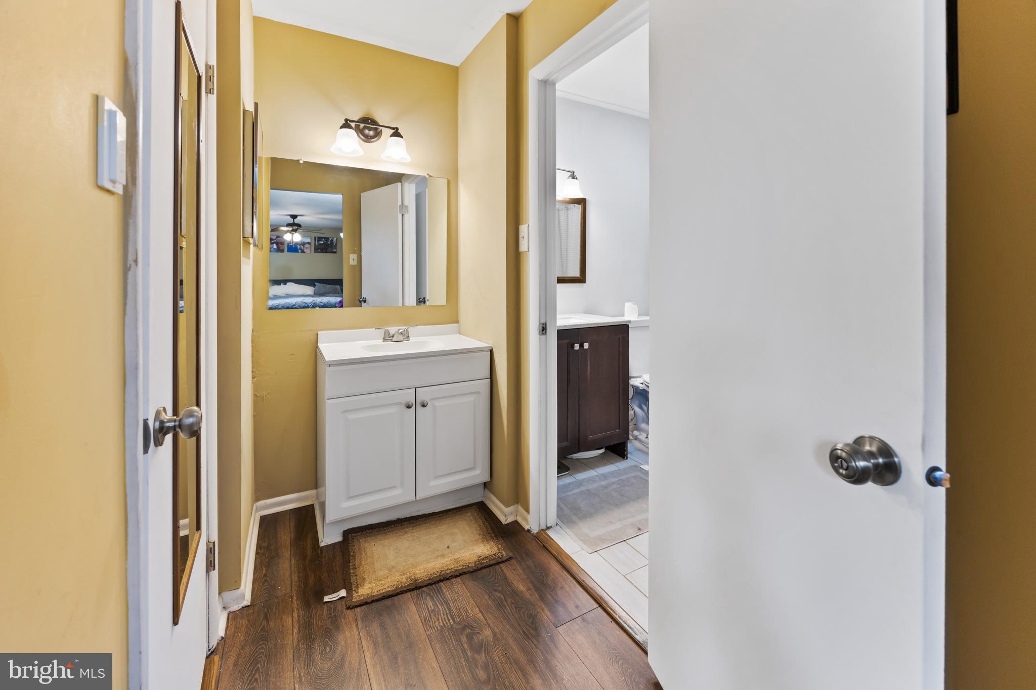 1715 Willow Place Clementon, NJ 08021 - Photo 28 of 37 a bathroom with a sink and a mirror