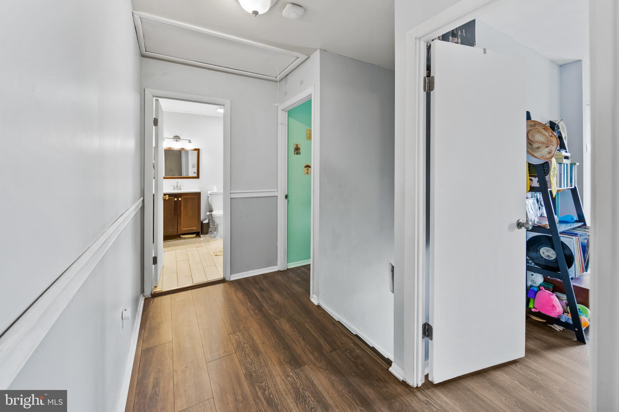 1715 Willow Place Clementon, NJ 08021 - Photo 29 of 37 a view of hallway with wooden floor and stairs