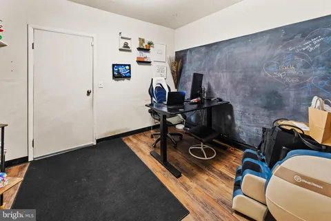 a view of workspace with wooden floor workspace