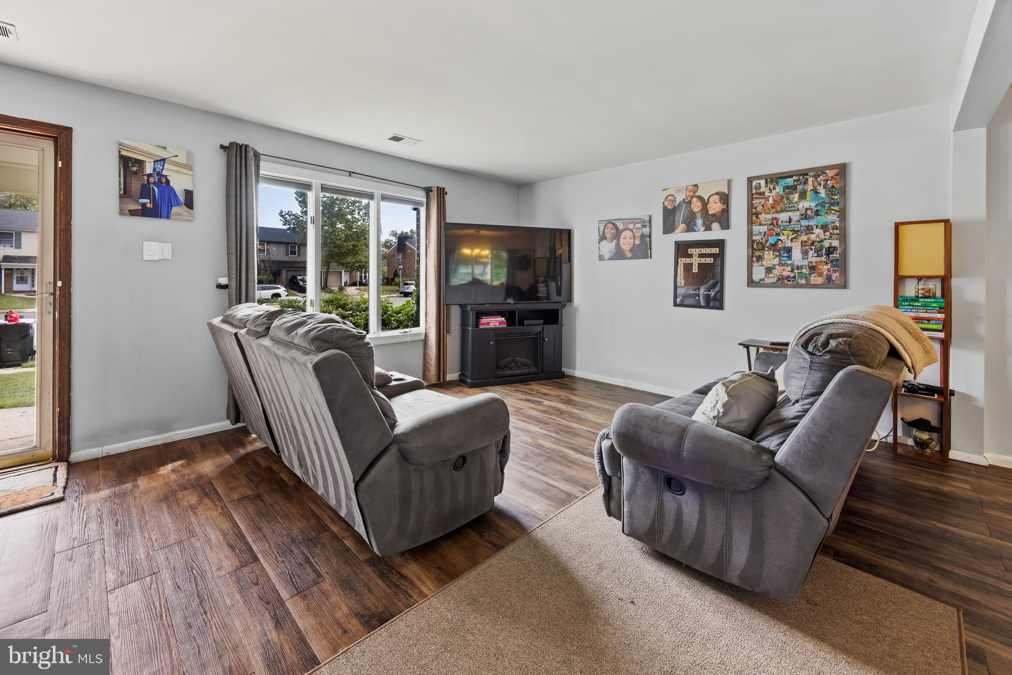 1715 Willow Place Clementon, NJ 08021 - Photo 4 of 37 a living room with furniture and a flat screen tv