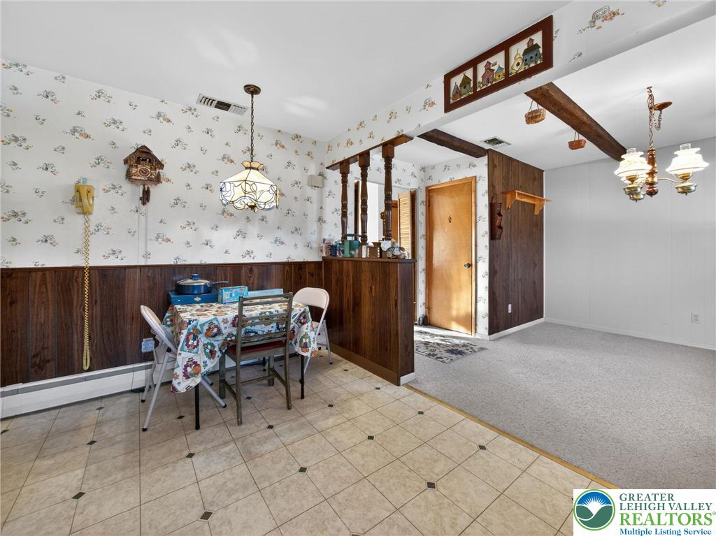 481 Forrest Avenue Bethlehem, PA 18017 - Photo 12 of 32 a dining room with furniture and chandelier